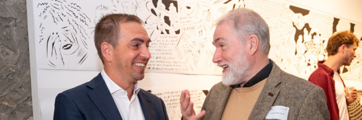 Philipp Lahm und Dr. Klaus-Volker Schütz